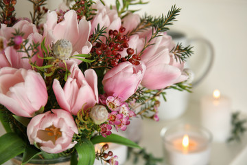 Obraz na płótnie Canvas Beautiful bouquet with spring pink tulips on light background, closeup