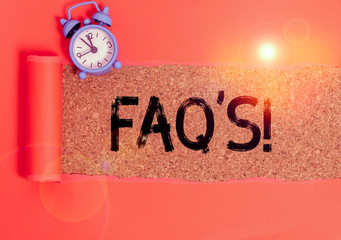 Conceptual hand writing showing Faq. Concept meaning a list of questions and answers relating to a...