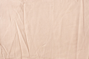 Background texture of natural coarse fabric with large dents