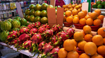 Stall of organic vegetables and fruits at a farmers market. Selling organic fresh agricultural product at farmer market.