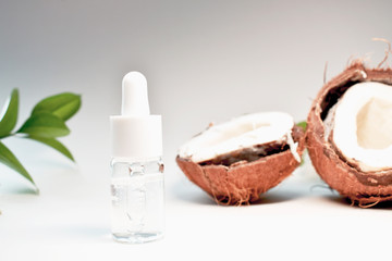 Cosmetic oil. Organic cosmetics. Herbal medicine or cosmetics with herbal extracts on a pink background. Copy space.
