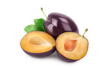 fresh purple plum and half with leaves isolated on white background with clipping path and full depth of field