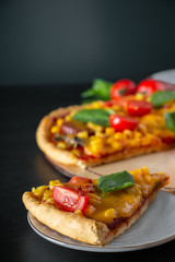 Pizza on a gray background. Authentic national dish of Mediterranean cuisine.