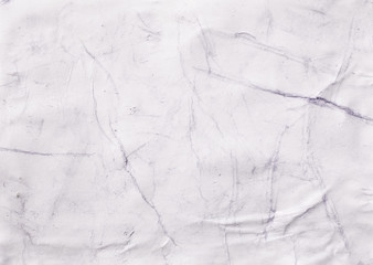 Background texture of wet crumpled paper with stains of paint