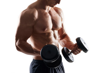 Naklejka premium Strong, fit and sporty bodybuilder man over white background.