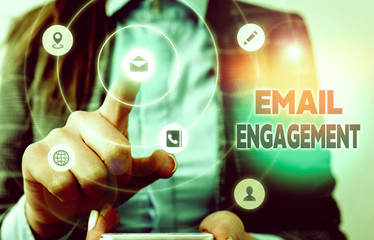 Conceptual hand writing showing Email Engagement. Concept meaning measure how subscribers engage in...