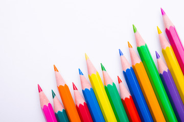 Different color pencils on white background. Composition with colored pencils, closeup view, space for text