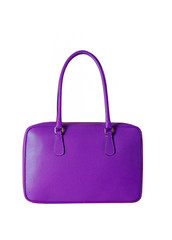 Beautiful purple handbag isolated on white background. High quality leather purse. 