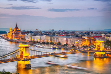 Fototapeta na wymiar View at Chain bridge, river Danube and famous building of Parliament.