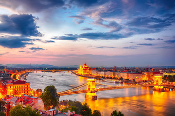 View at Chain bridge, river Danube and famous building of Parliament.