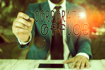 Conceptual hand writing showing Corporate Office. Concept meaning central location for planning and...