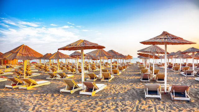 Sun umbrellas and deckchairs on the Copacabana beach, part of Great Beach (Velika Plaza) in Ulcinj