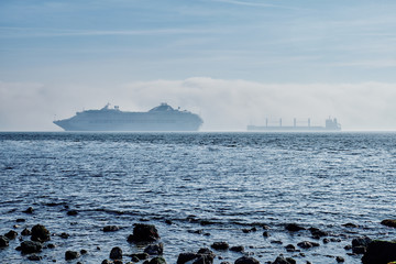 Cruise ship and cargo ship off the coast of Lisbon.