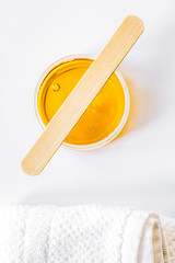 concept depilation with wax on white background top view