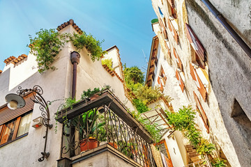 Buildings in the alley called Hallergasse in Merano in South Tyrol, Italy - obrazy, fototapety, plakaty