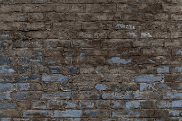 Old vintage shabby brick wall with peeling plaster. Grungy loft texture, background.