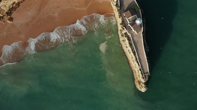 Aerial view of cliff with chapel Ermida de Nossa Senhora da Rocha