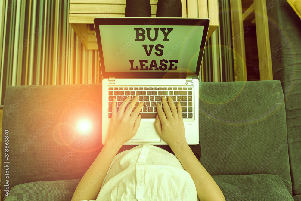 Poster writing note showing buy vs lease. business concept for own something versus borrow it advantages di