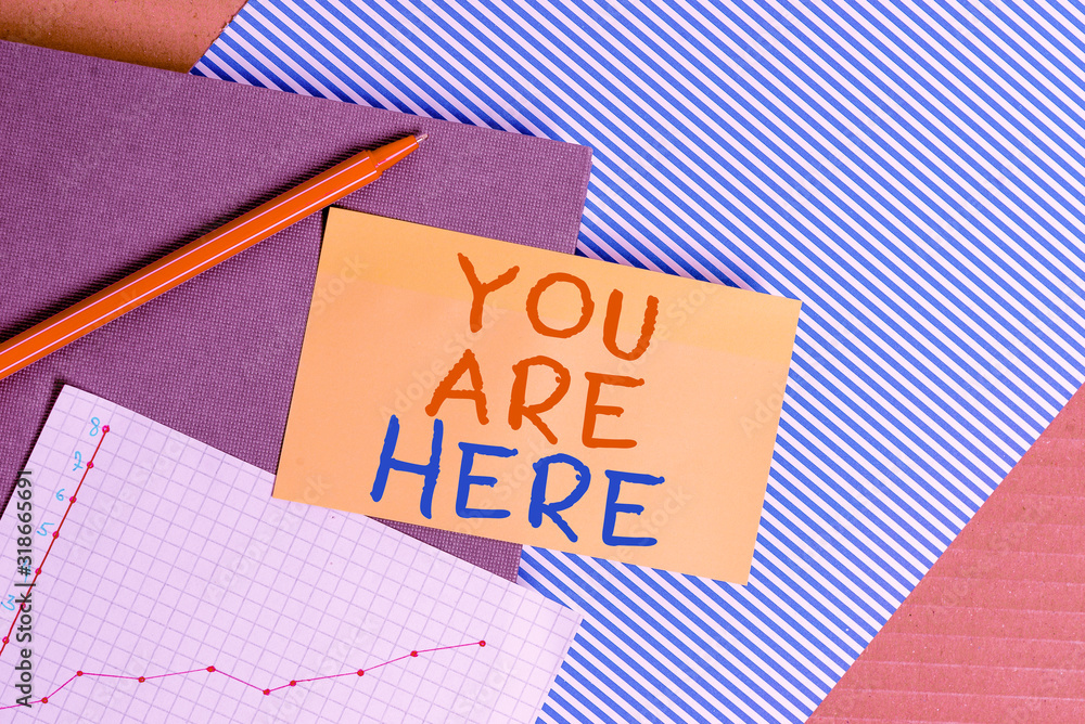 Aufkleber conceptual hand writing showing you are here. concept meaning this is your location reference point 