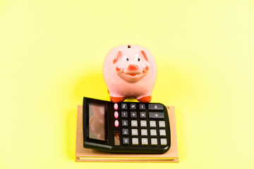 bookkeeping. financial report. moneybox with calculator. Piggy bank. capital management. money saving. Accounting and payroll. planning counting budget. Commerece business. Time for payoff