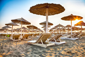 Sun umbrellas and deckchairs on the Copacabana beach, part of Great Beach (Velika Plaza) in Ulcinj