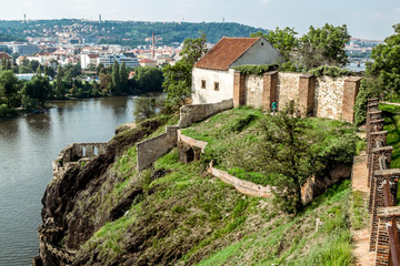 Fototapeta na wymiar View from the height of the Visegrad district in Prague on the Vltava river and the city.