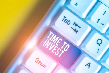 Conceptual hand writing showing Time To Invest. Concept meaning Creation of capital capable of...