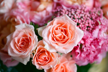 Delicate bouquet of eustomas, carnations, cotton, spray roses and David Austin roses, in pink and beige colors. - 318668867