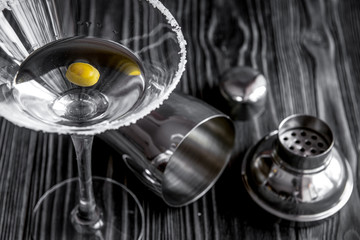martini cocktail at wooden background close up