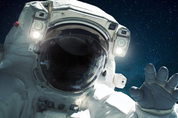 Spaceman in outer space. Welcome to space. Astronaut close up