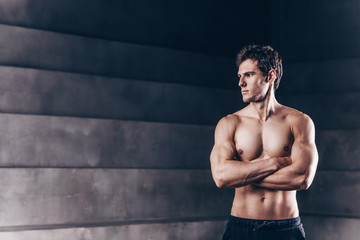 Portrait of a confident shirtless bodybuilder.