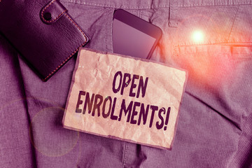 Conceptual hand writing showing Open Enrolments. Concept meaning when employees may make changes to...