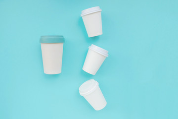 Reusable eco friendly resistant bamboo cup and many plastic glasses.