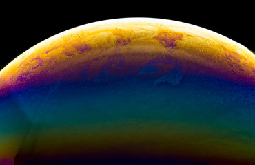 Colors and shapes created in a soap bubble.