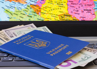 passport with dollar bills on the background of the map of Europe 222