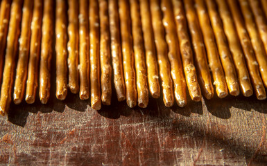 geometric still life of salty cookies straws