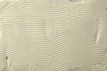 Margarine yellow background and texture