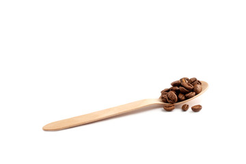 Wooden spoon with coffee beans  isolated on white background