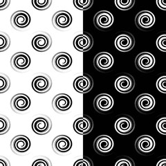 Two seamless monochrome black and white spiral polka dot patterns useful for textile, fabric, wrapping paper, wallpaper, … Original design, vector eps 10