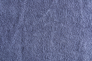 Texture of a gray terry towel close-up. Home life.