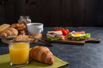 Breakfast with orange juise and croissant