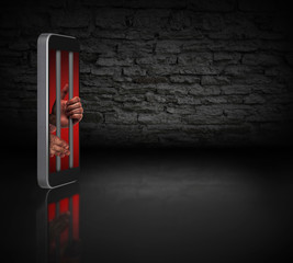 Internet addiction with a person being trapped inside a smartphone and reaching out from behind the...