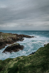 Fototapeta na wymiar rocks atlantic ocean waves splashing ocean landscape