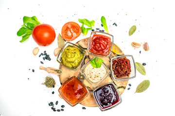  set of sauces on white background
