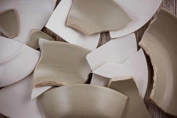 Broken Plate  on the floor in the kitchen The concept of accidents in the kitchen is dangerous for...
