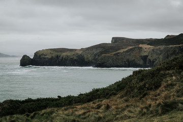 Fototapeta na wymiar a field of atlantic ocean and rocks in the background