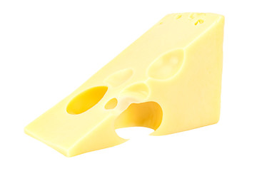 Lying triangular piece of Maasdam cheese isolated on a white background