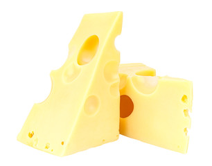 Standing and lying two triangular pieces of Maasdam cheese isolated on a white background