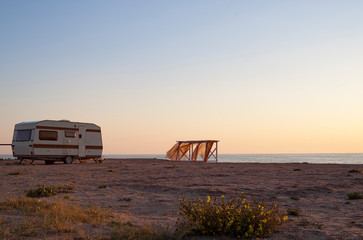  trailer and gazebo by the sea in the morning