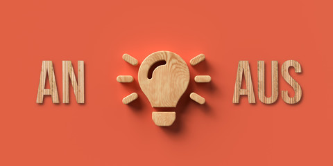 wooden lightbulb with the German words for ON and OFF on orange background